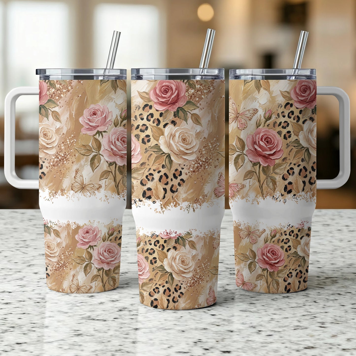 Three tumblers with floral and leopard print designs, featuring roses and butterflies.