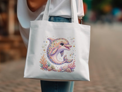 White tote bag with colorful sequined dolphin and coral reef print.