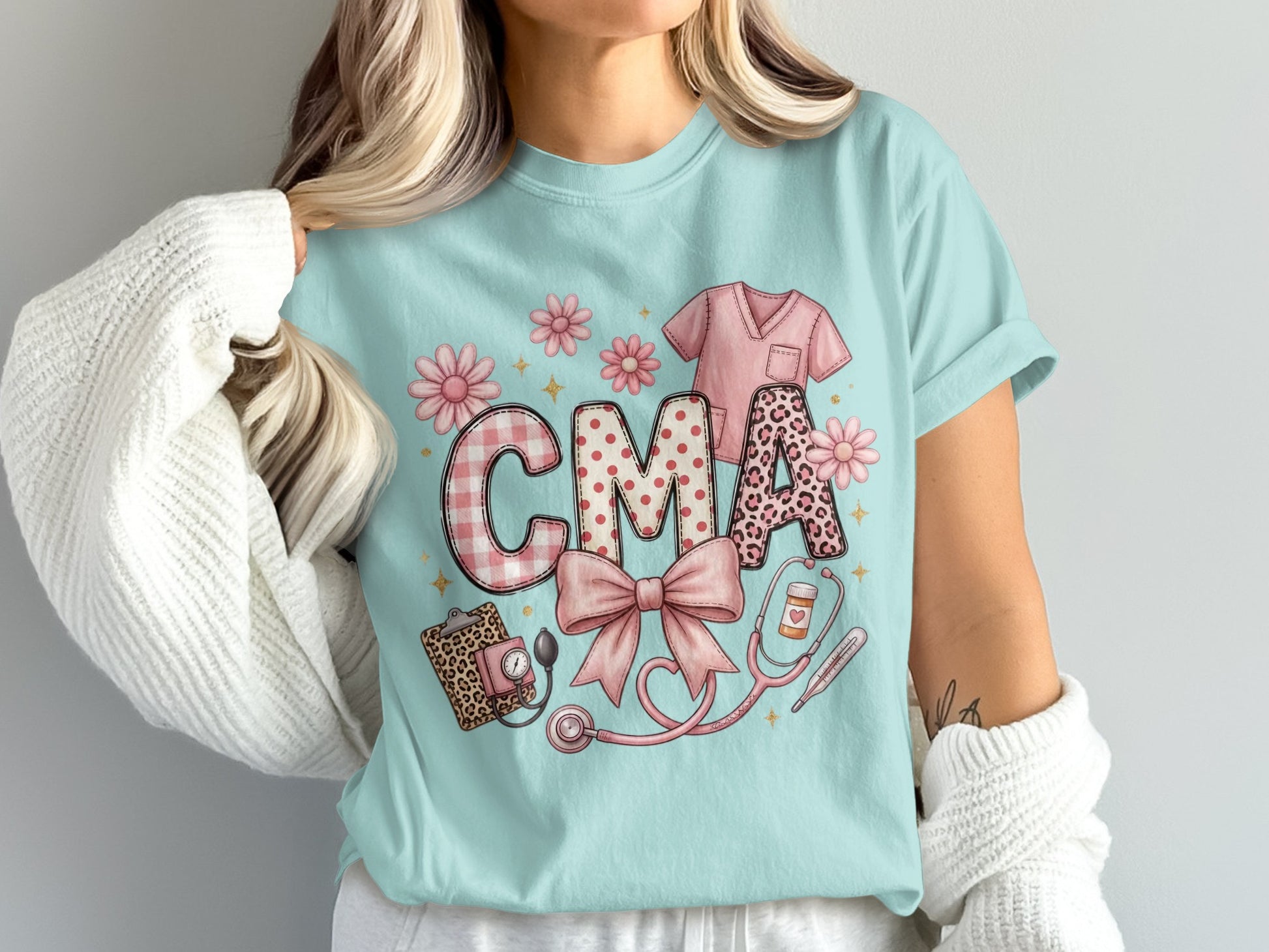 CMA text with stethoscope, scrub top, and leopard print heart.