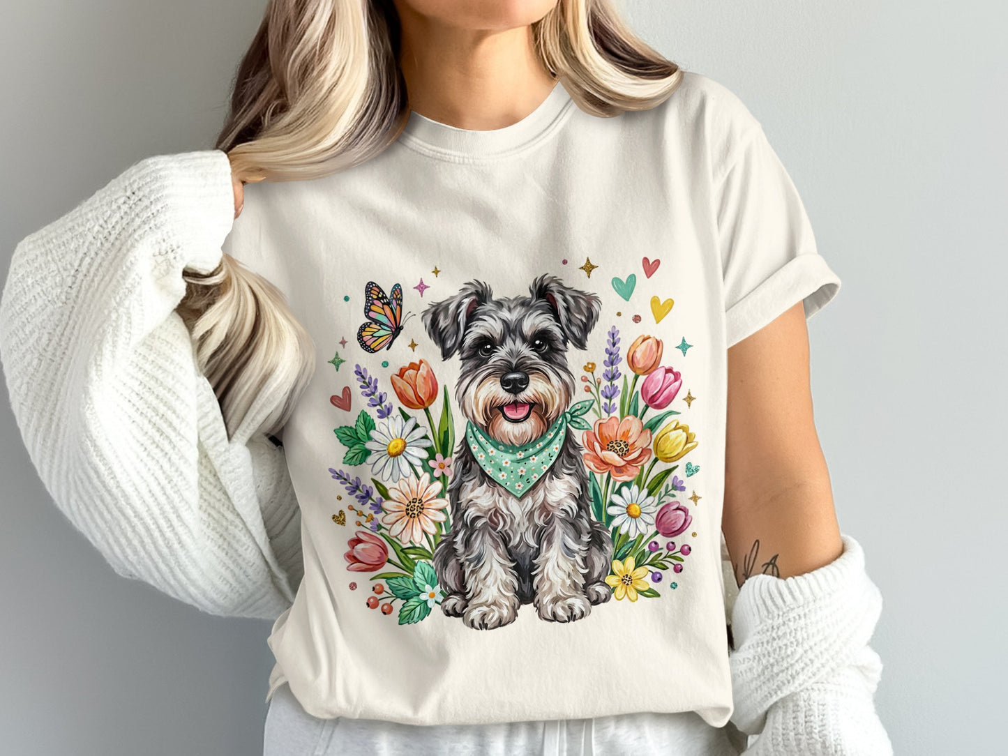 Schnauzer wearing a bandana surrounded by watercolor flowers and a butterfly.