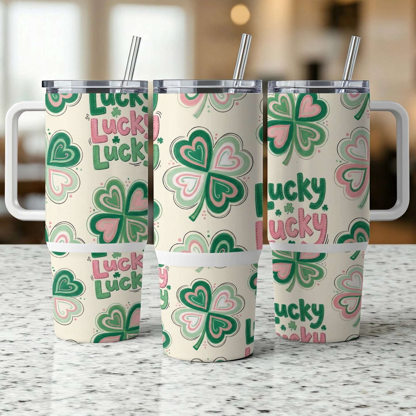 Three insulated tumblers with shamrock and "Lucky" pattern.