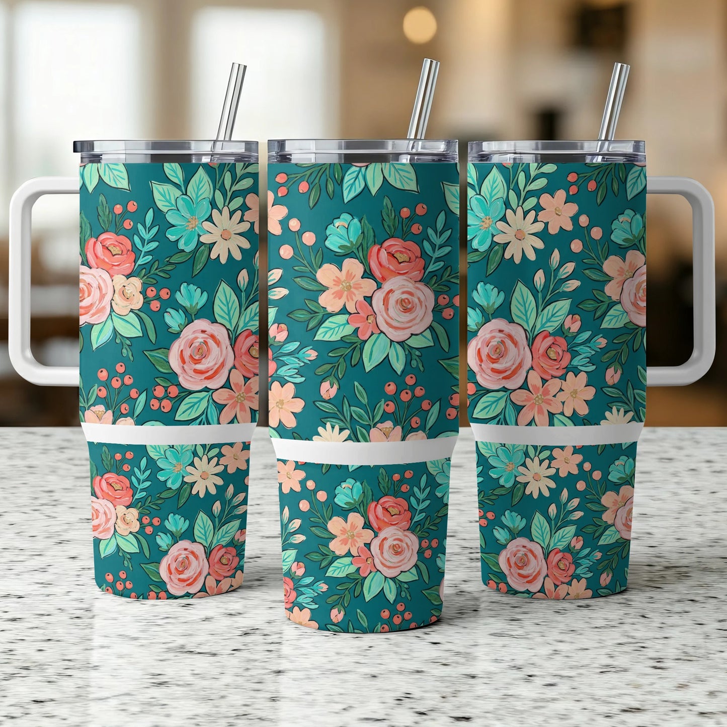 Teal tumbler with floral pattern and white handle, side view.