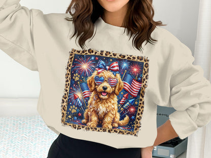 Golden retriever in patriotic sunglasses, fireworks, and leopard print border on sweatshirt.