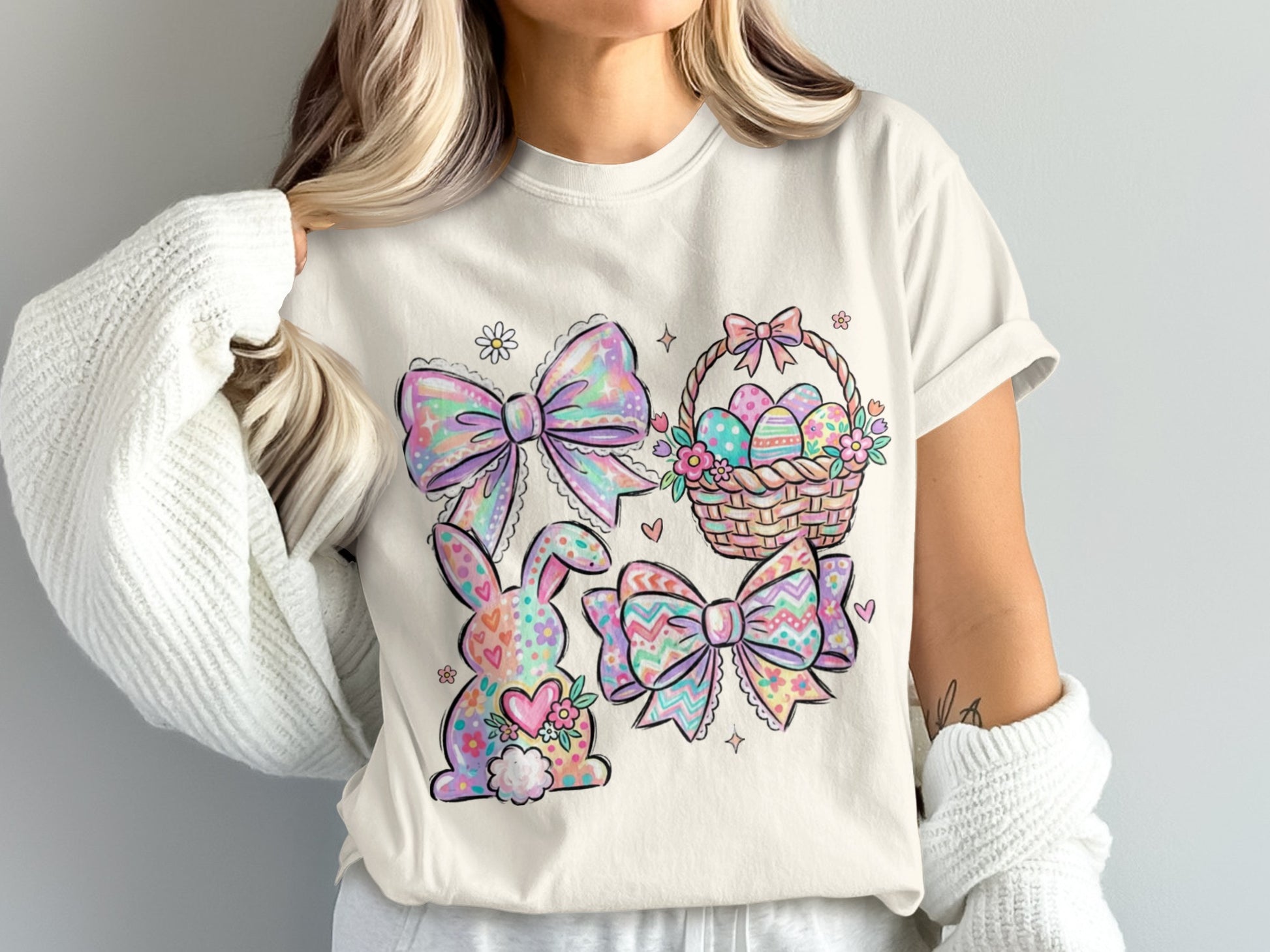 Easter graphic featuring a bunny, basket of eggs, and bows.