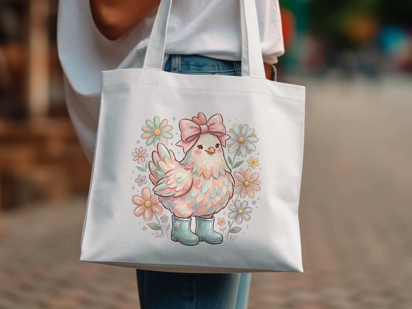 Tote bag with pastel chicken wearing boots and surrounded by flowers.
