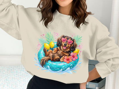 Sweatshirt with dachshund wearing sunglasses relaxing in a pool float.