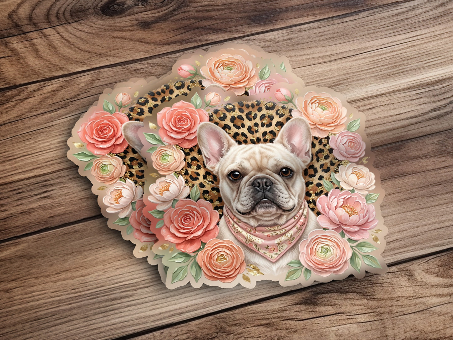French bulldog with flowers and leopard print bandana on wooden background.