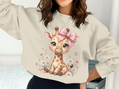 Giraffe with pink bow and flowers on a cream sweatshirt.