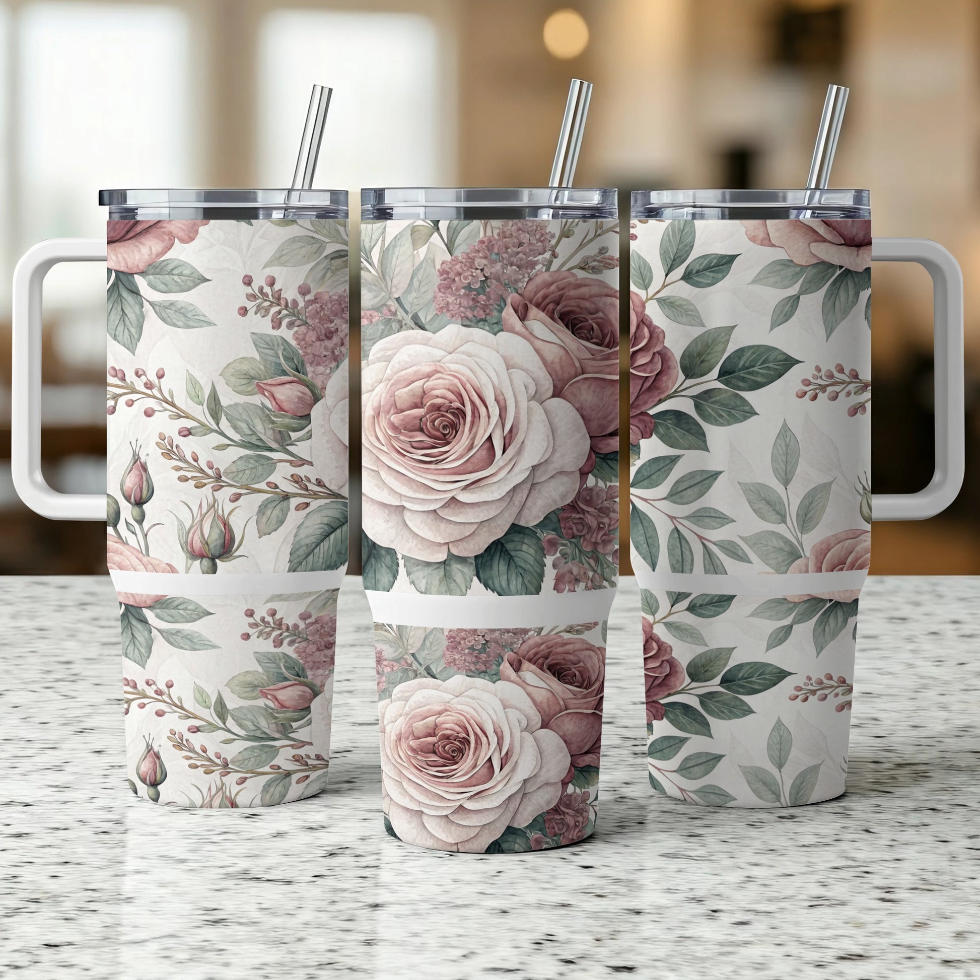 Three tumblers with floral rose and leaf pattern, with metal straws.
