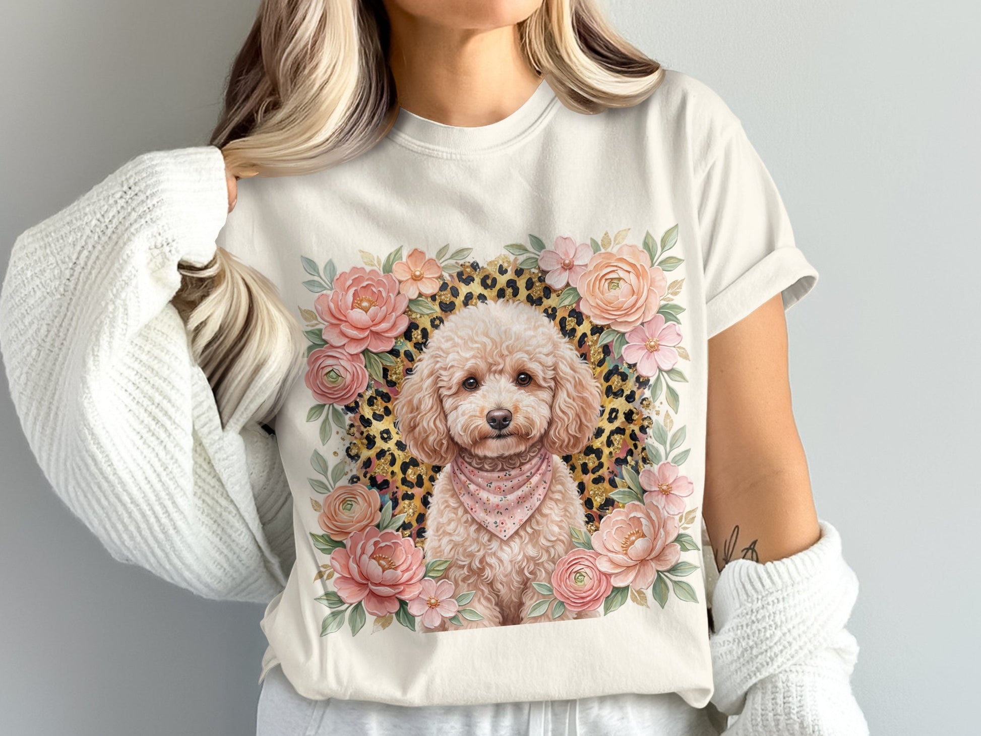 Cream t-shirt with poodle portrait surrounded by pink flowers and leopard print.