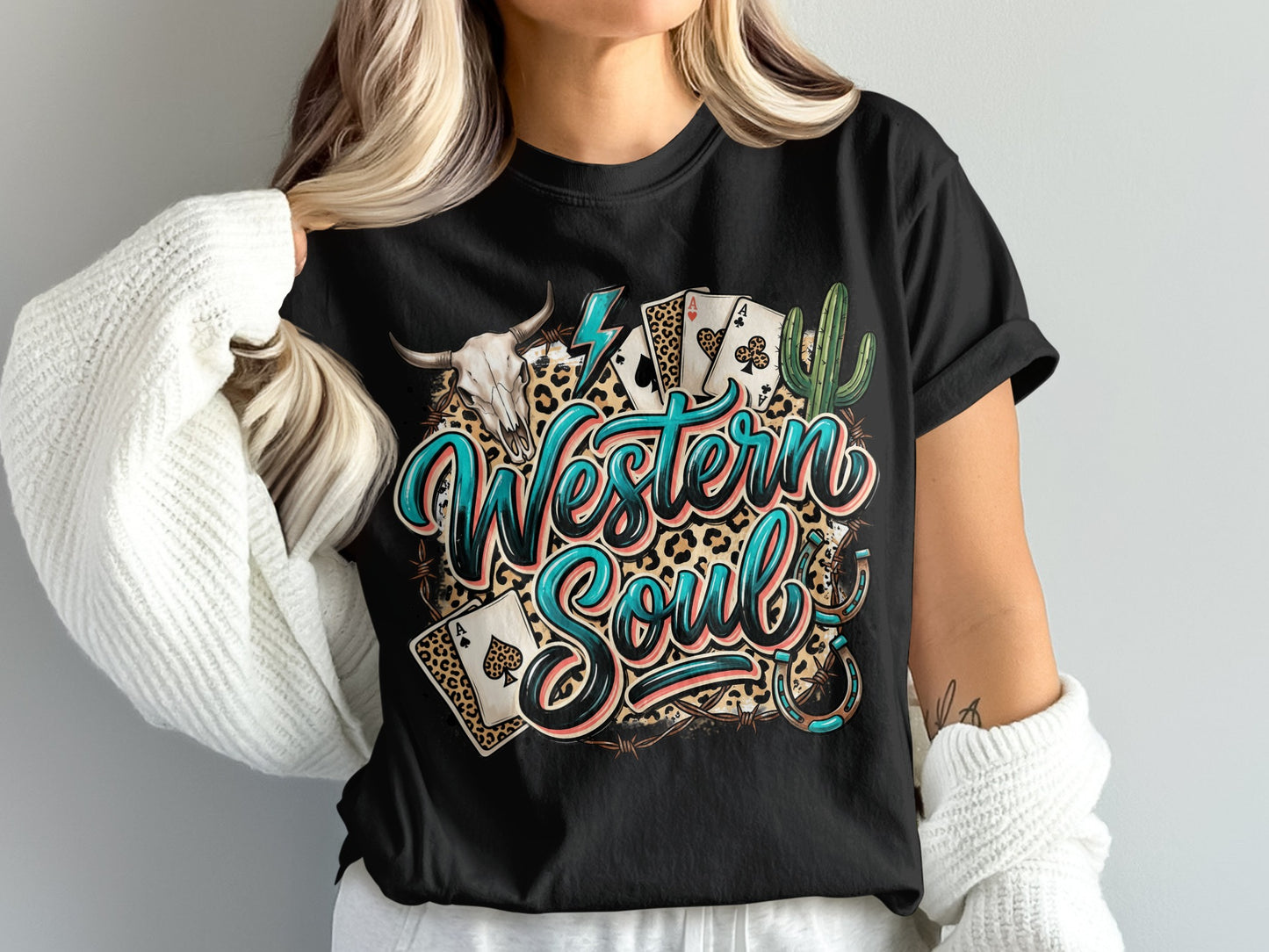 Black t-shirt with "Western Soul" text, bull skull, cards, and cactus.
