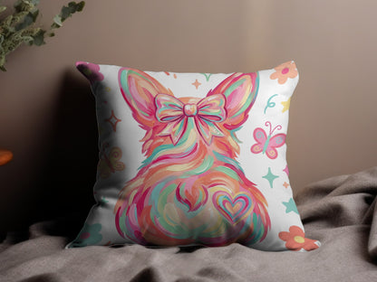 Decorative pillow with a colorful corgi, bow, heart, and butterflies.