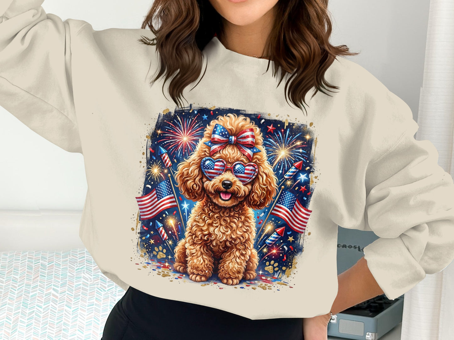 Poodle wearing sunglasses with American flags and fireworks, printed on a sweatshirt.