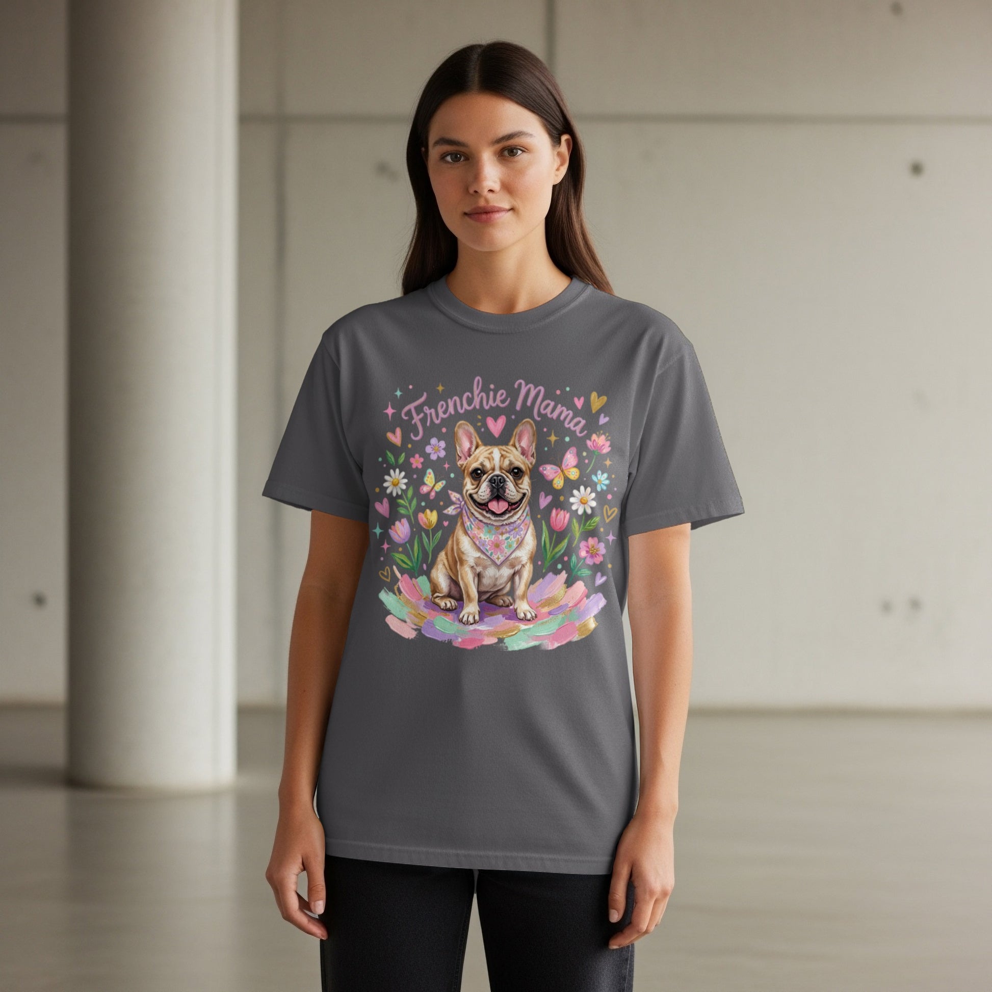 Woman wearing grey t-shirt with Frenchie Mama and dog graphic.
