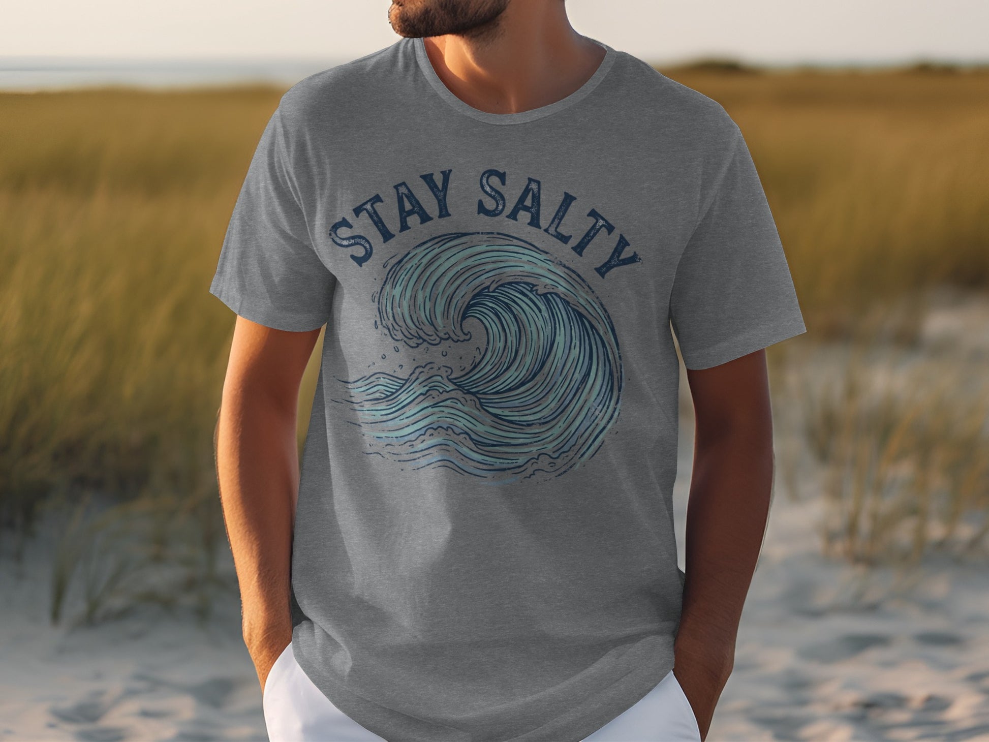 Grey t-shirt with "Stay Salty" text and wave graphic.