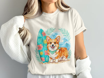 Corgi dog wearing bandana next to surfboard and waves, on a t-shirt.