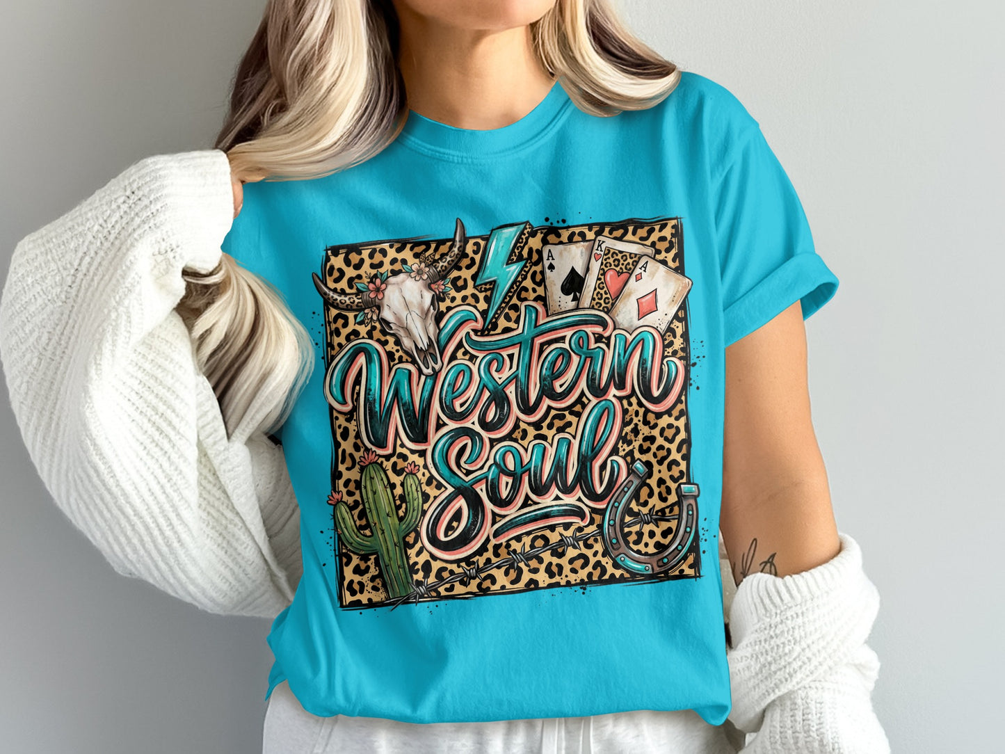 Western Soul graphic tee with skull, cactus, horseshoe, and playing cards.