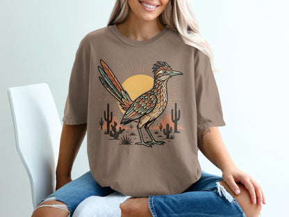 T-shirt with desert scene featuring a roadrunner, sun, and cacti.