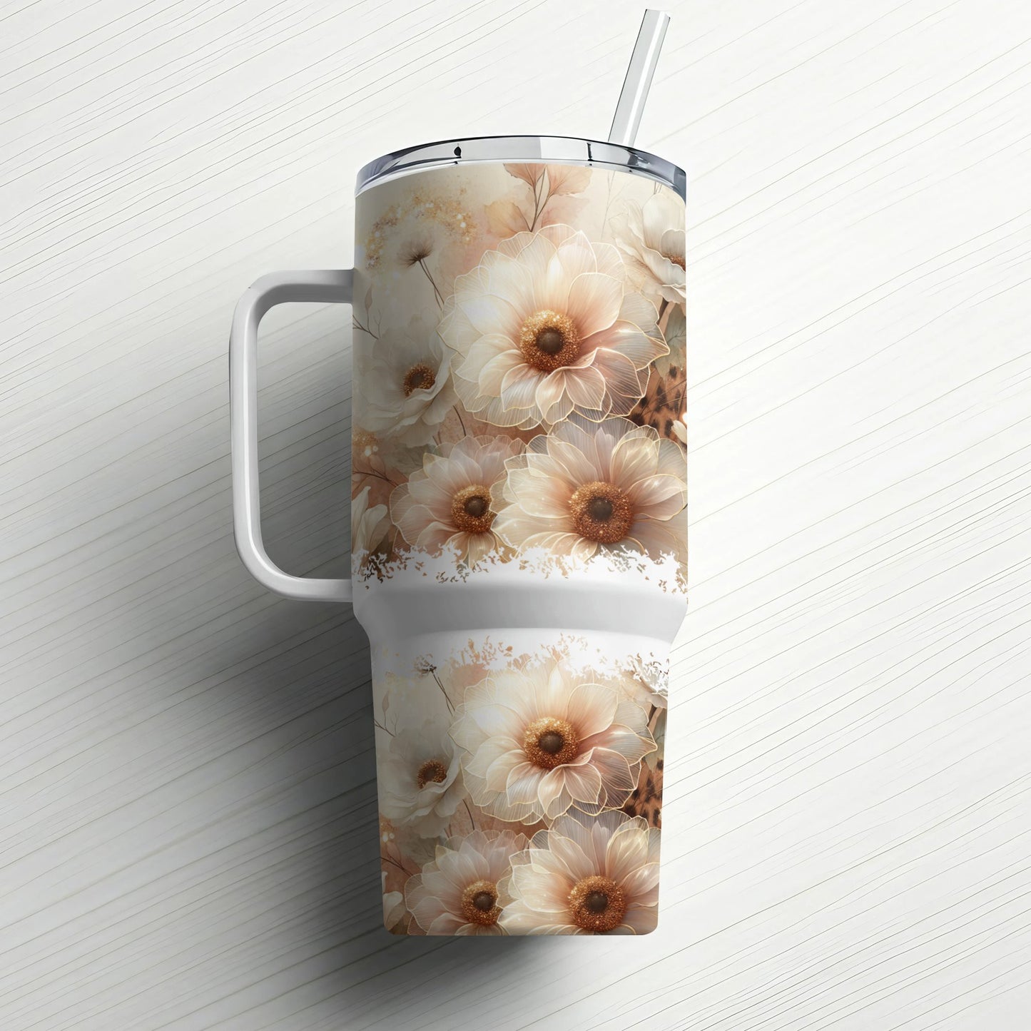 White travel tumbler with floral and leopard print design and straw.