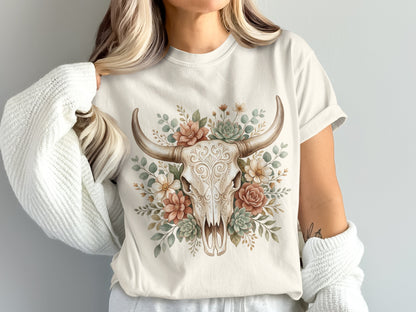 Cream t-shirt with a skull surrounded by flowers and succulents.