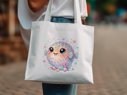 White tote bag with a cute, smiling pufferfish and pastel hearts design.