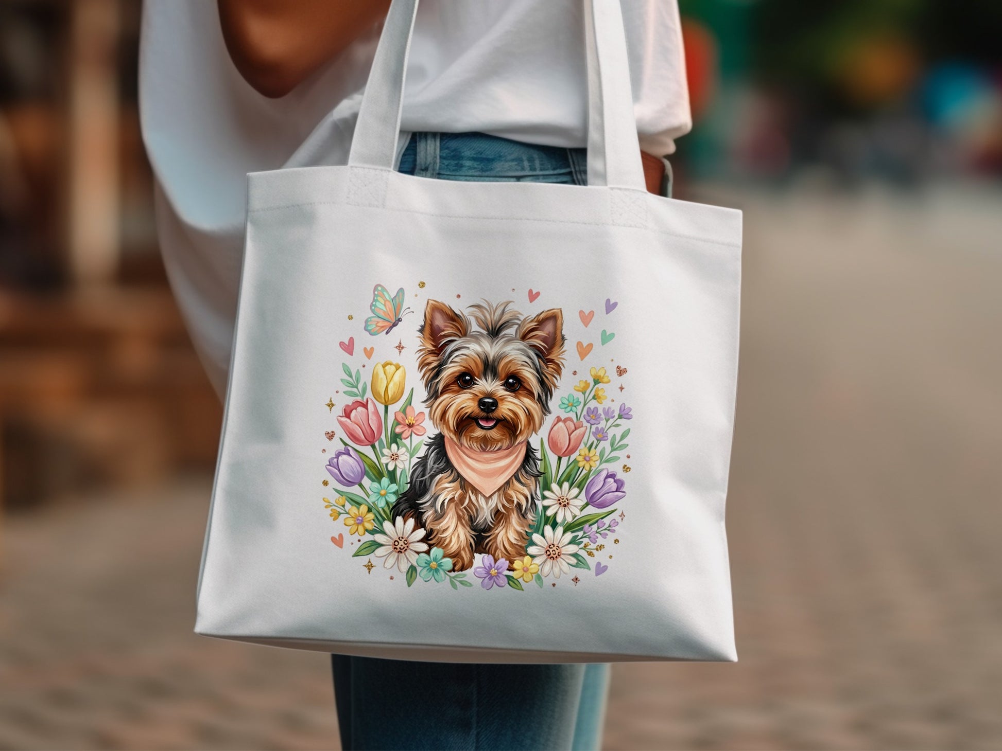 Yorkshire terrier in a floral wreath with butterflies on a white tote bag.