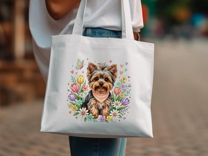 Yorkshire terrier in a floral wreath with butterflies on a white tote bag.