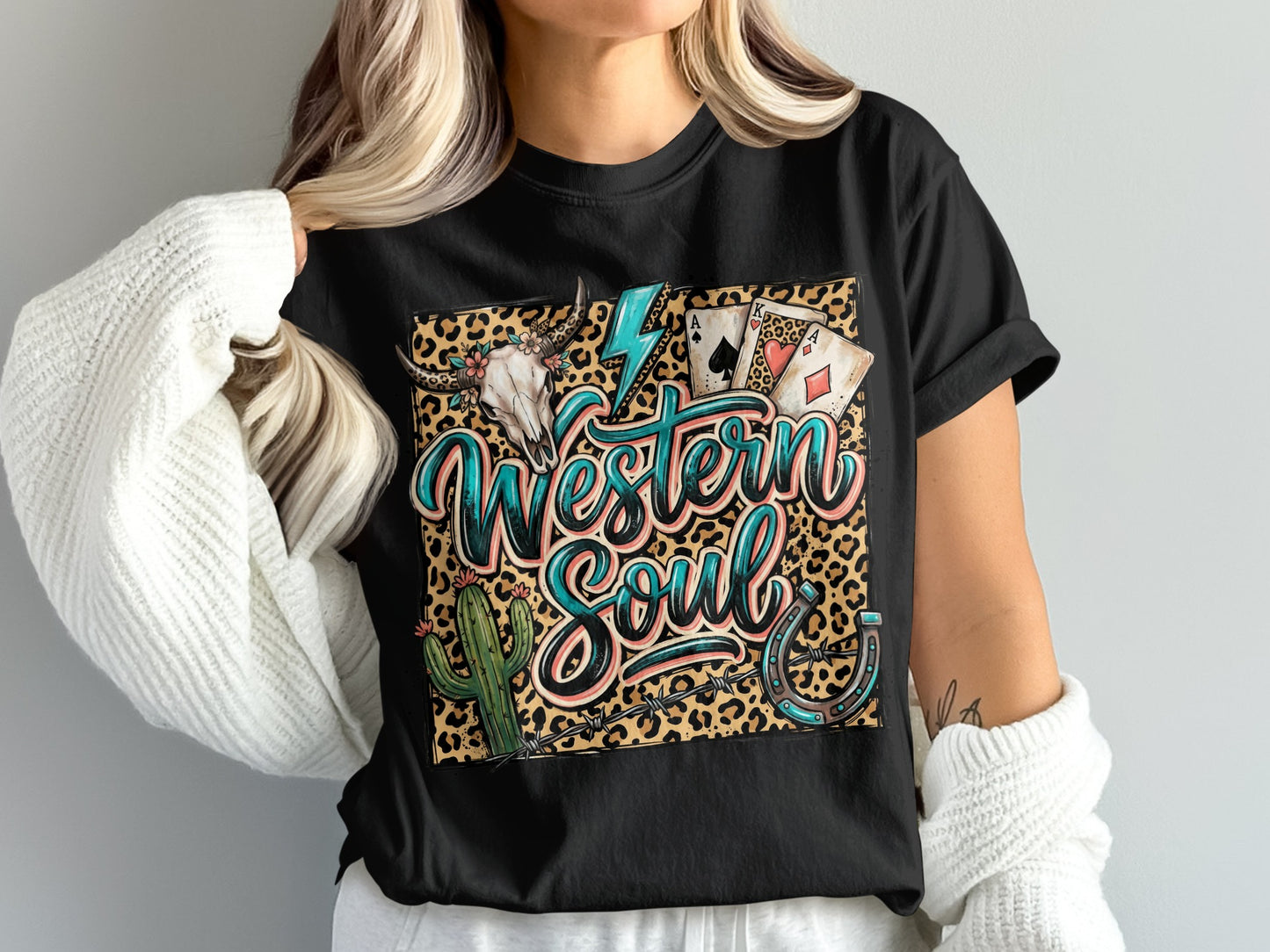 Western Soul graphic tee with skull, cards, horseshoe, cacti, and lightning.