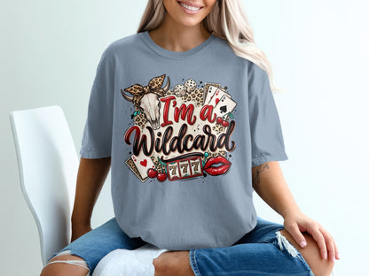 T-shirt with "I'm a Wildcard" text, skull, dice, cherries, slot machine, and lips.